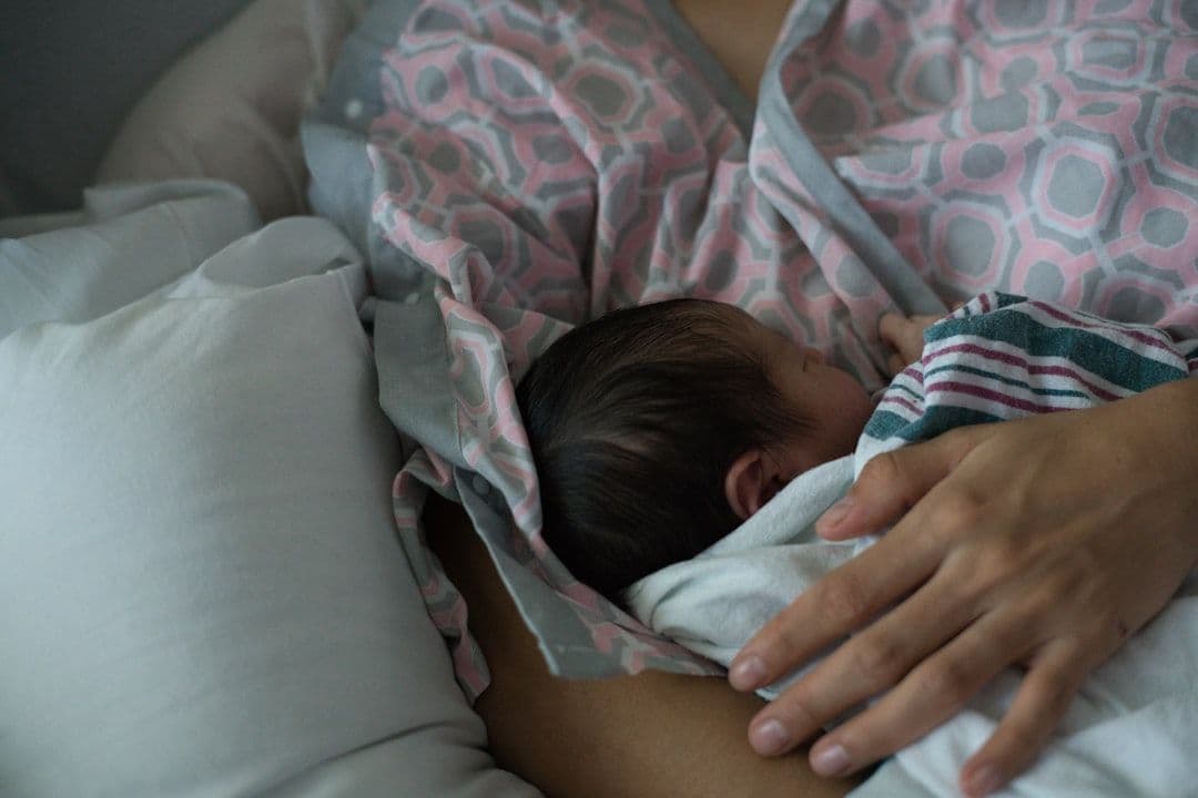 Breastfeeding and Postpartum Wellness: What Research Shows — holistic health