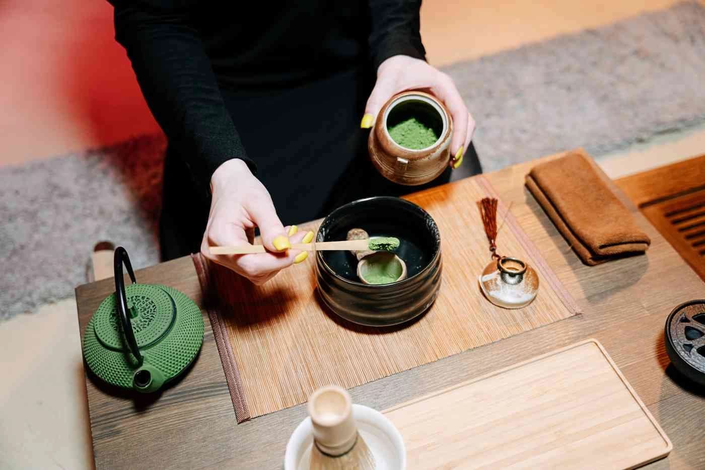 Chinese herbal medicine ingredients arranged in bowls