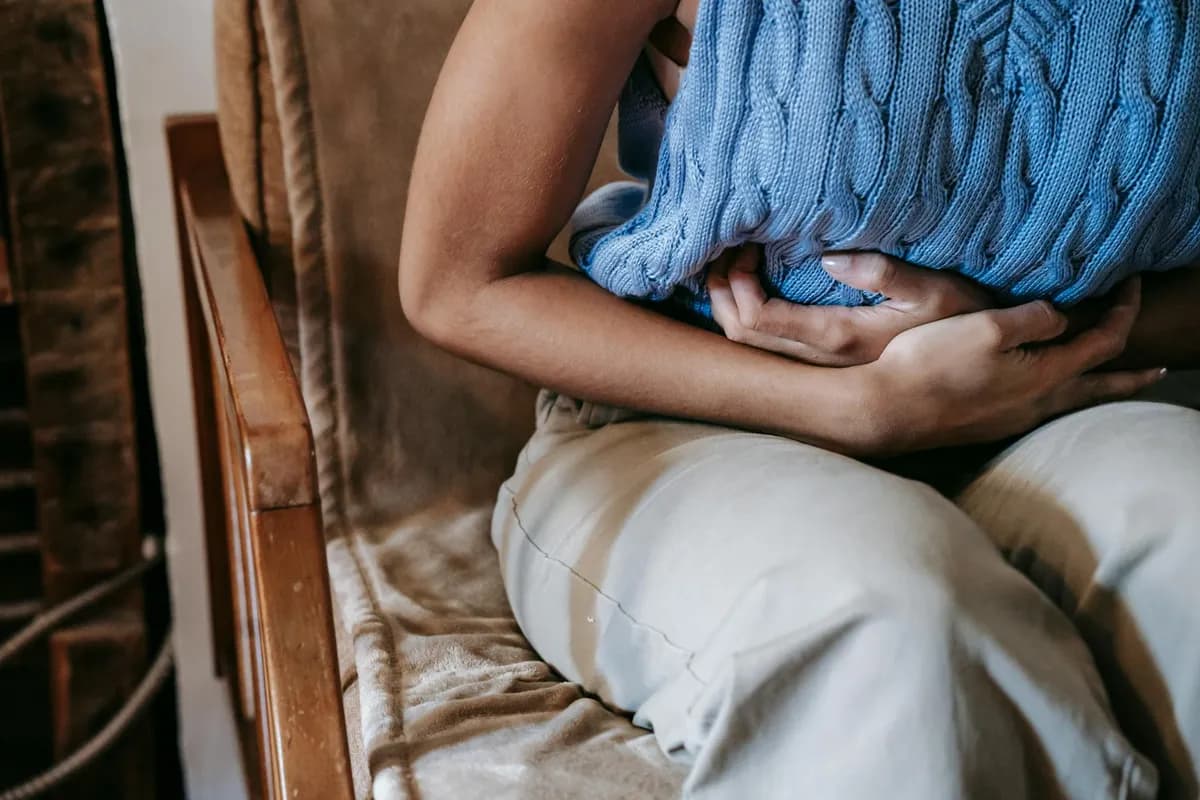 Pain worsens with sitting, standing, or certain movements — health symptom